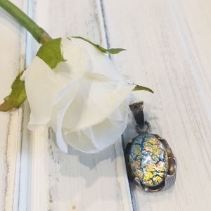 Fun cat’s eye charm